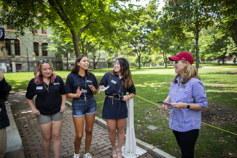 penn president liz magill interviews students on college green